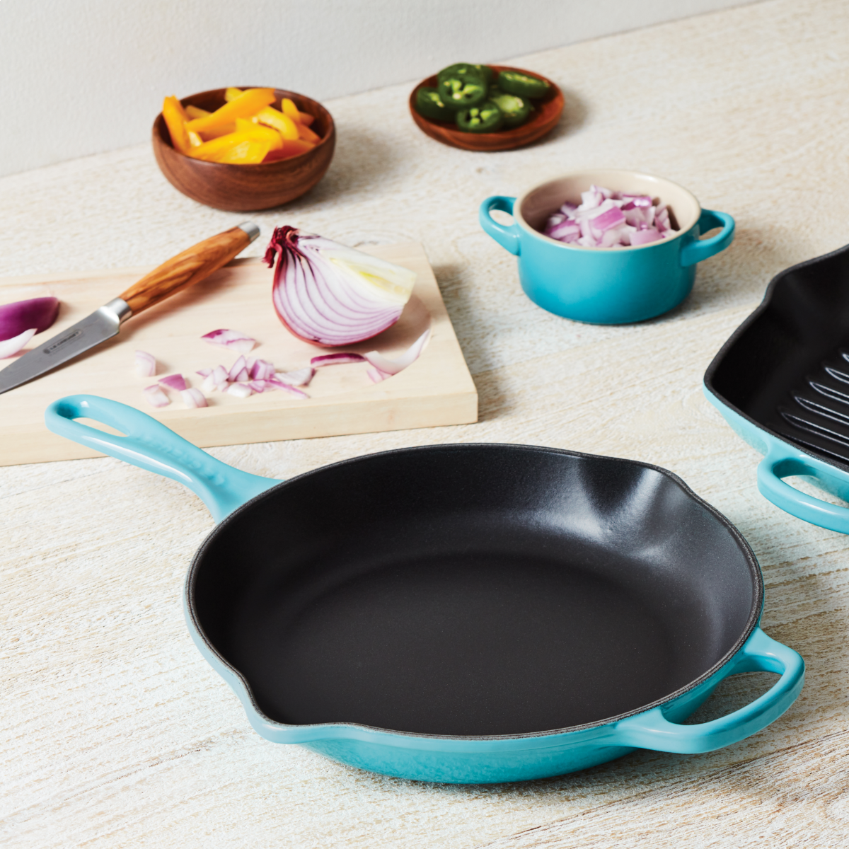 Le Creuset 10.25" Signature Enameled Cast Iron Skillet | Caribbean Blue 4 Le Creuset 10.25" Signature Enameled Cast Iron Skillet | Caribbean Blue - Image 2