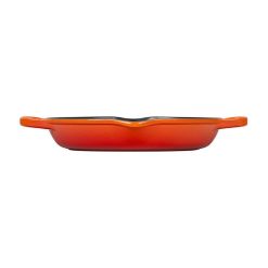 Le Creuset 9.75" Deep Round Signature Grill Pan | Flame Orange 4 Le Creuset 9.75" Deep Round Signature Grill Pan | Flame Orange -STAUB Shop flame orange deep grill pan side view