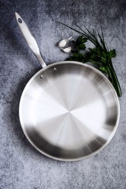 Heritage Steel Cookware Stainless Steel Fry Pan | 12" 5 Heritage Steel Cookware Stainless Steel Fry Pan | 12" -STAUB Shop hsc 14914 hammer stahl 12in fry pan lifestyle hero shot