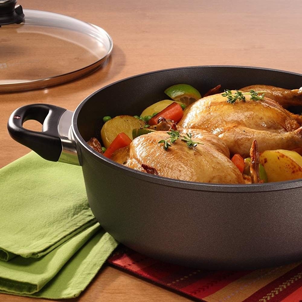 Swiss Diamond | HD Classic 5.3-Quart Braiser with Lid (11") Swiss Diamond | HD Classic 5.3-Quart Braiser With Lid (11") -STAUB Shop swiss diamond cookware braiser and dutch oven 11in 5.3qt with lid lifestyle4 6928c 1